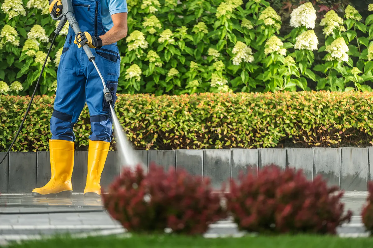 man-pressure-washing